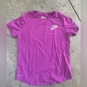 Purple women’s Nike dry fit running shirt
